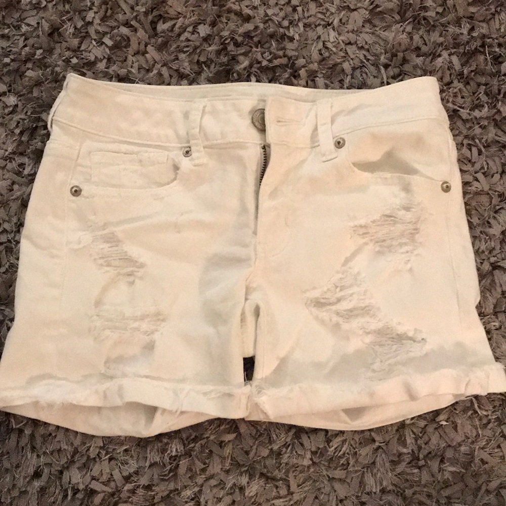 White ripped American Eagle shorts
